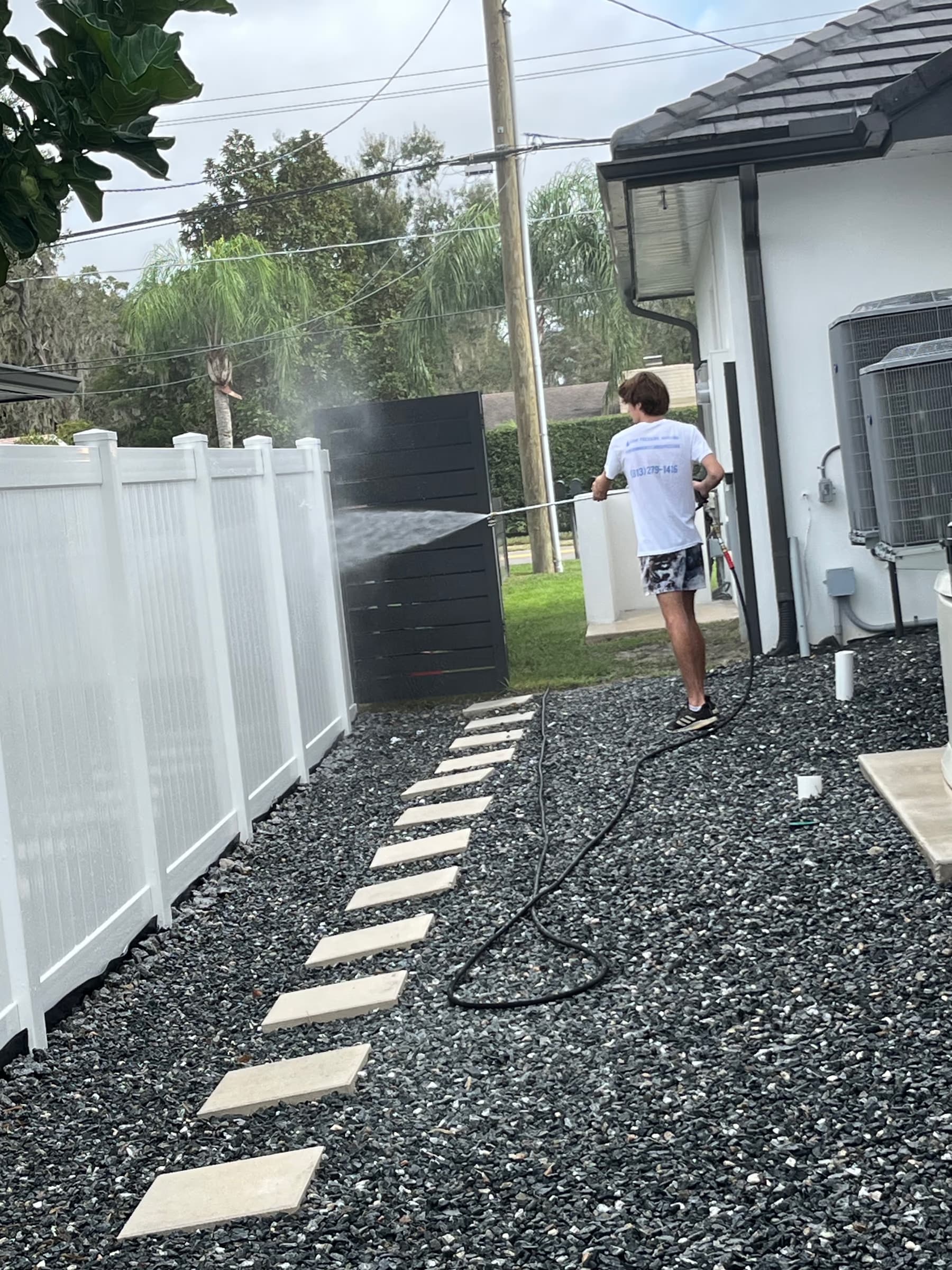 Fence and exterior cleaning example representative of Citrus Park backyard pressure washing work
