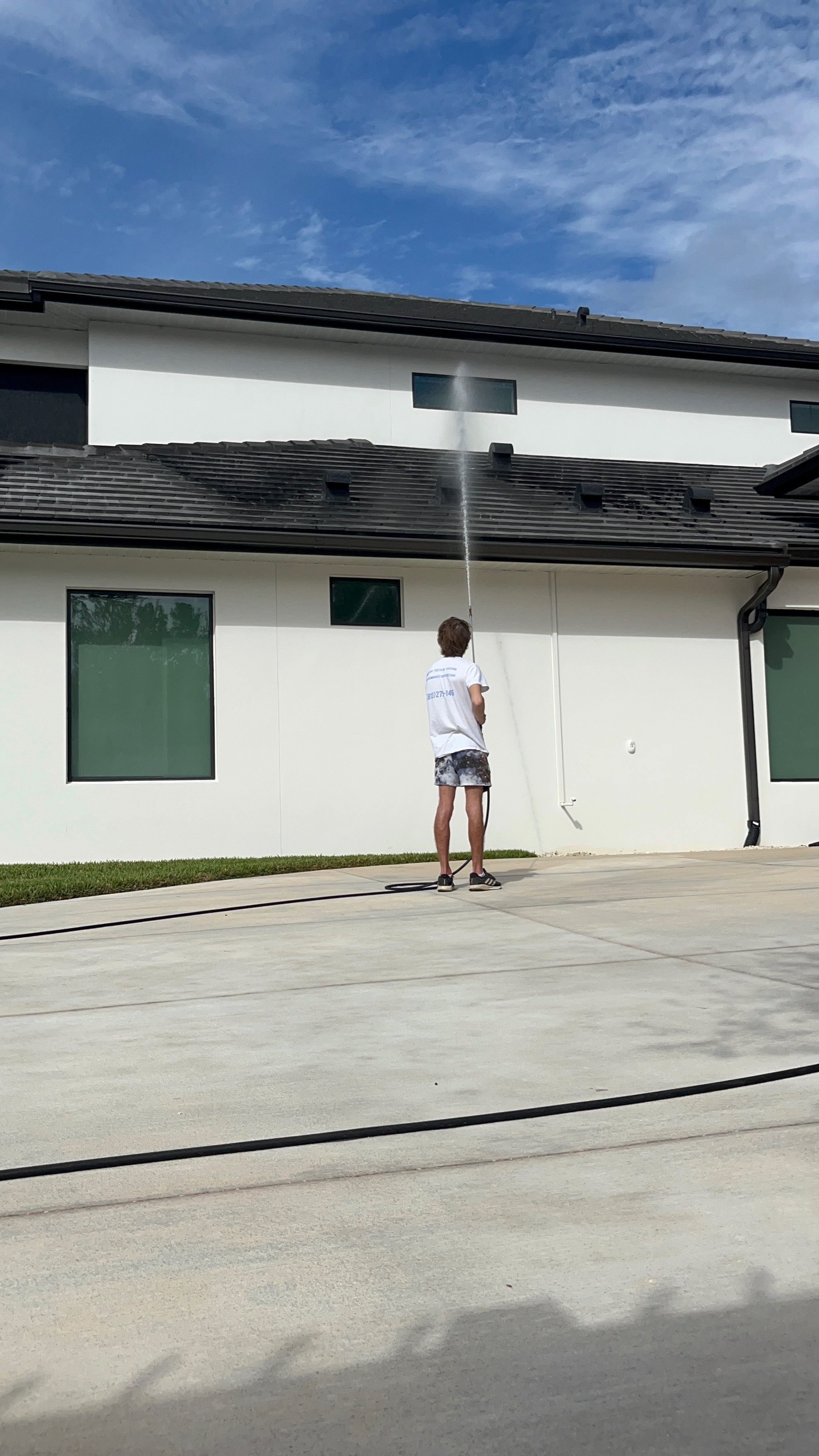 House washing service in Tampa on a residential exterior wall