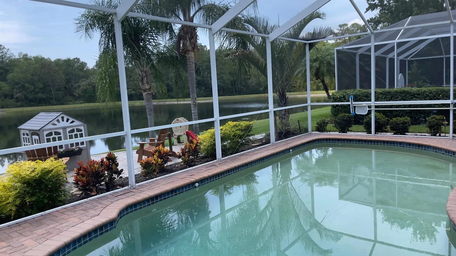 Screened lanai and enclosure structure in Tampa before or during cleaning